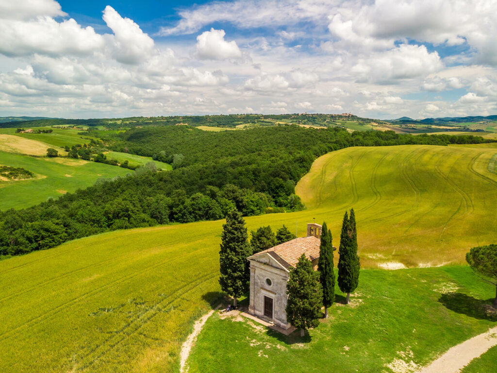 Signature Tuscany at Summer’s End: villages, natural springs, and millenary abbeys